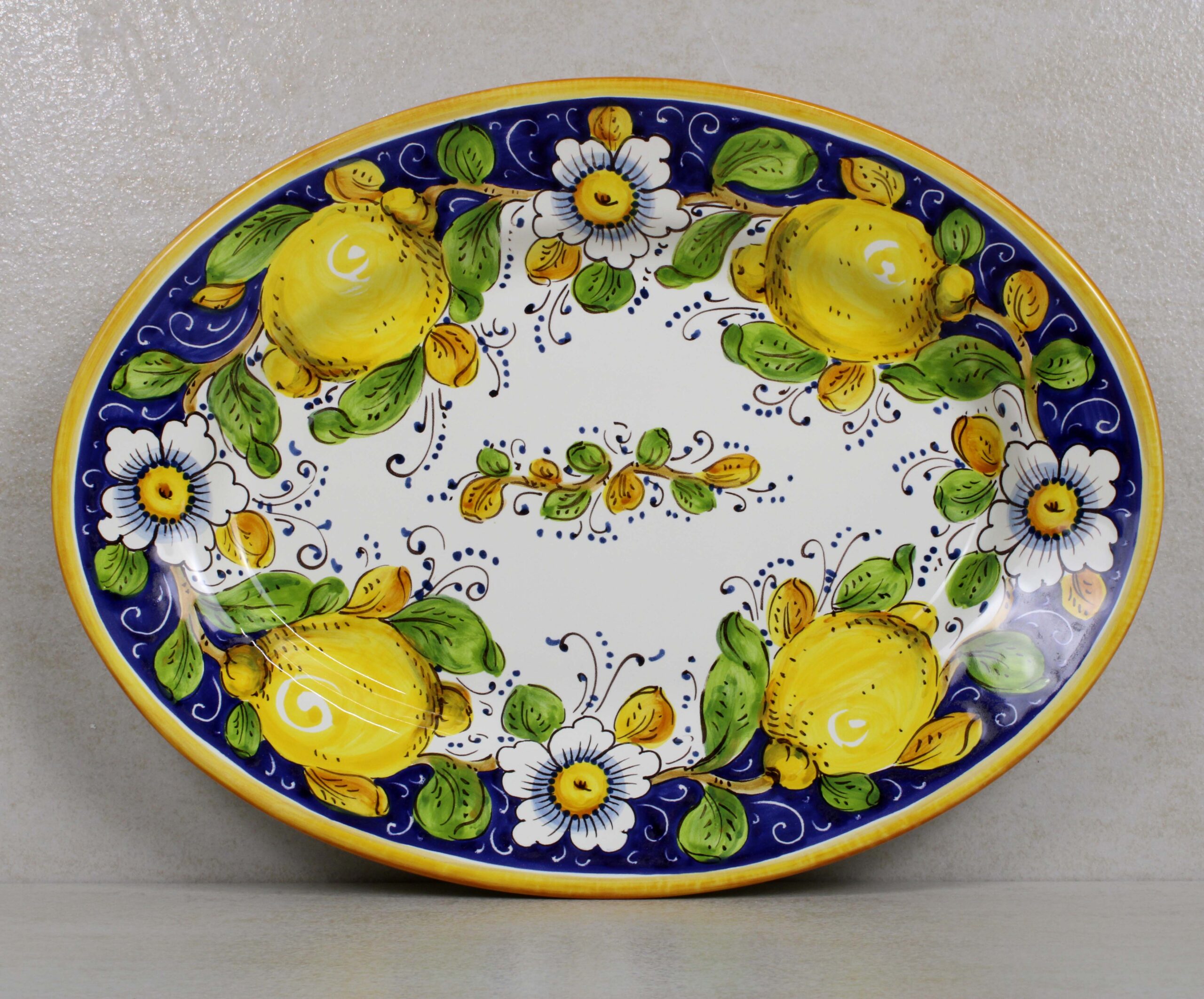 Vassoio Ovale in ceramica decorato a mano "Limone Blu"